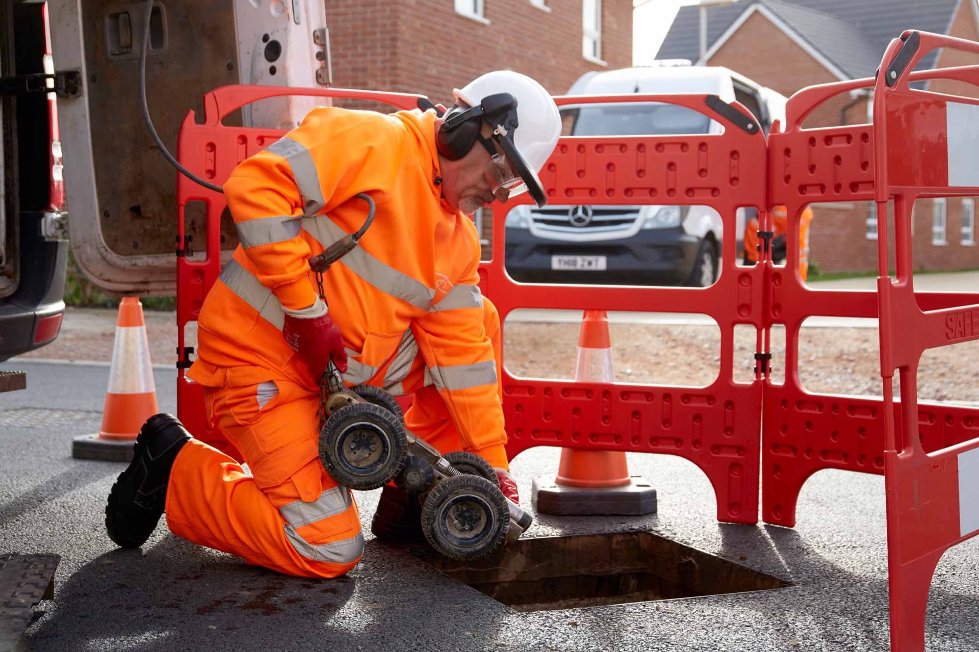 Engineer carrying out a CCTV drain survey