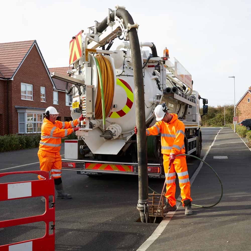 Jet vac unit cleaning a culvert